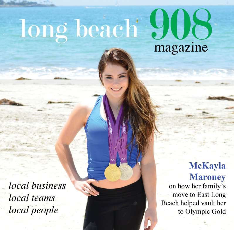 Olympic athlete on beach with medals for Long Beach 908 Magazine
